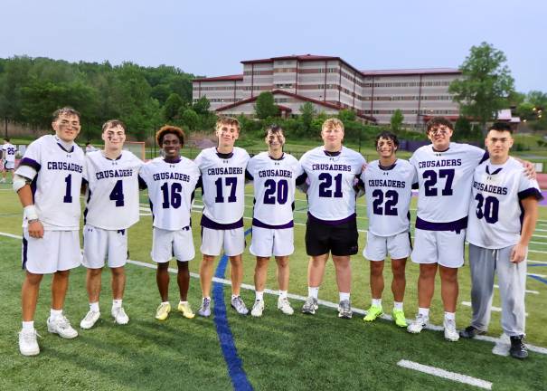 The seniors on this year’s team were honored in a brief ceremony after the game. (L-R) Gavin Fitzgibbon, Michael Luongo, Tyler Tenemille, Liam Williamson, Joey Buchanan, Ashton Capen, Anthony Severo, Jose Hernandez and Chadwick Kistler.