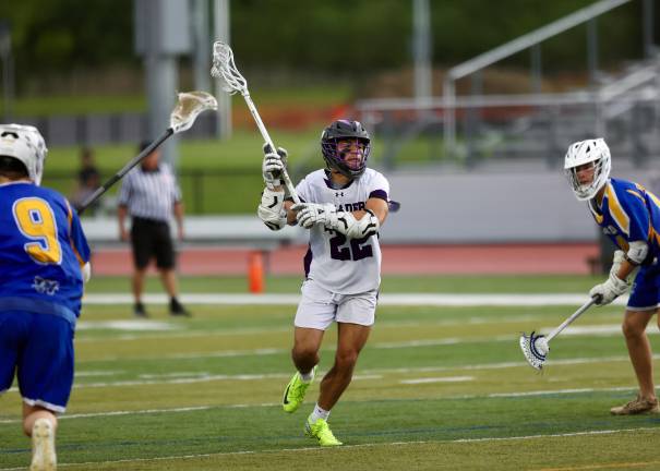 #22, Anthony Severo winds up to rip a shot on the Wizards goal; he scored four in the game with two assists.