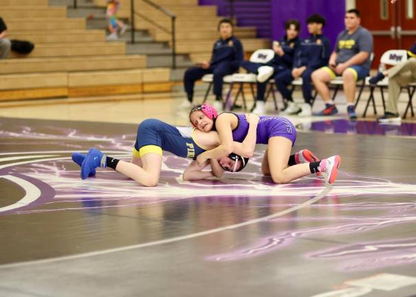 Gail Sullivan, top, won a close decision at 108 lbs.