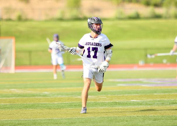 #17 Liam Williamson scored the first goal for the Crusaders.