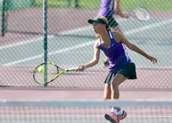 Maeve Cassidy got the Crusaders going with her 6-0, 6-0 victory in #1 singles