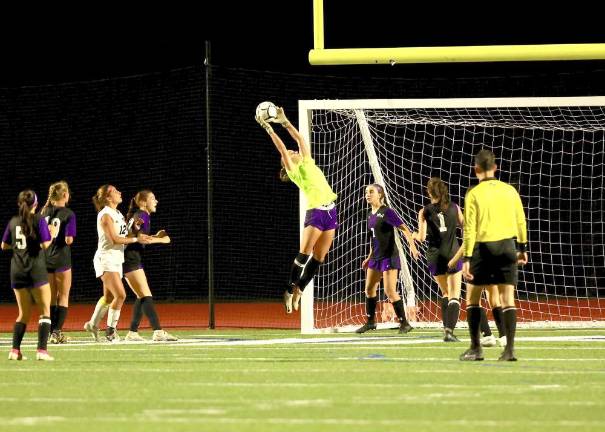 Crusader Goalie Reese Dolan makes a leaping save to keep the Bushmen off the board.