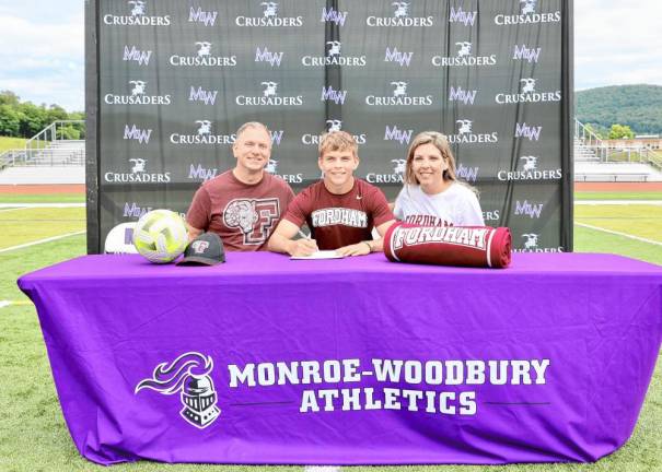 Ryan Mattison (center) and his parents. He will play soccer for Fordham.