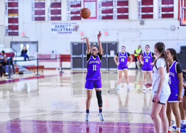 Chloe Ahorrio, #11, puts the Tigers away as she hits a free throw with :27 left in the game.