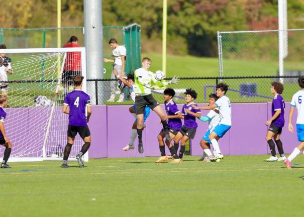 Crusader goalie Parker Giles kept the Crusaders in the game with several big saves.