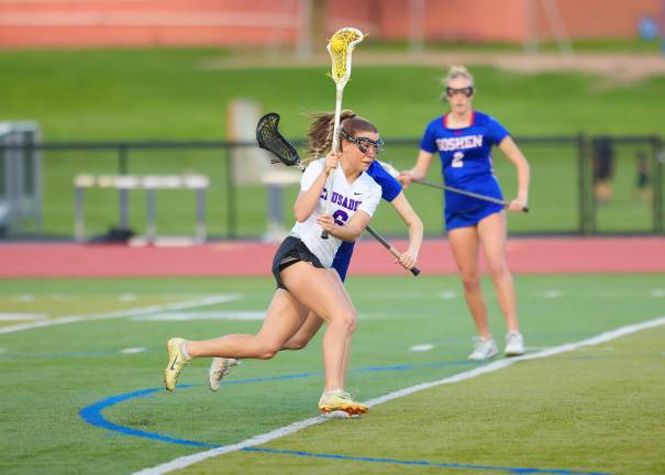 Kyra Gilligan races past a defender on her way to score her 200th goal.