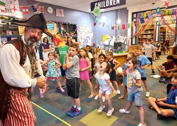 Children enjoying a pirate-themed program at the Monroe Free Library.