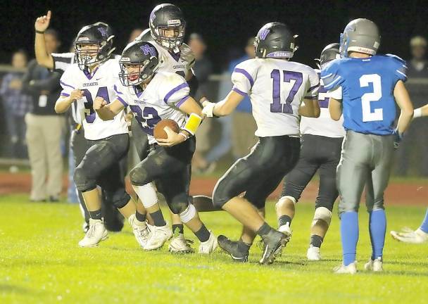 Nicholas Calderone celebrates his interception of a Viking pass to preserve the Crusaders' victory