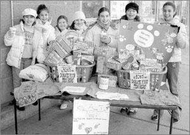 Monroe Junior Troop 278 makes a difference in the lives of animals