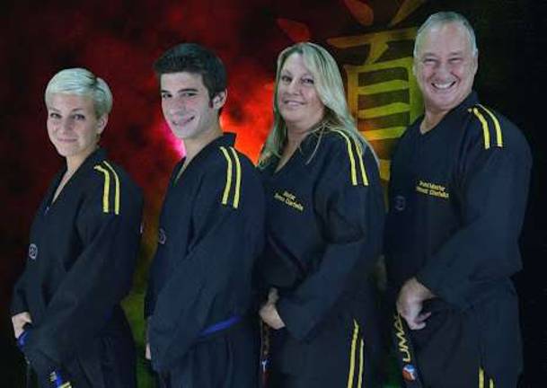 Provided photo United Martial Arts Centers is opening a new location in the Monroe Plaza off Route 17M in the Village of Monroe. Pictured from left to right are the people behind the centers' success: Master Danielle Ciarfella, Master Jason Bender, Master Teresa Ciarfella and Grand Master Edmund Ciarfella.