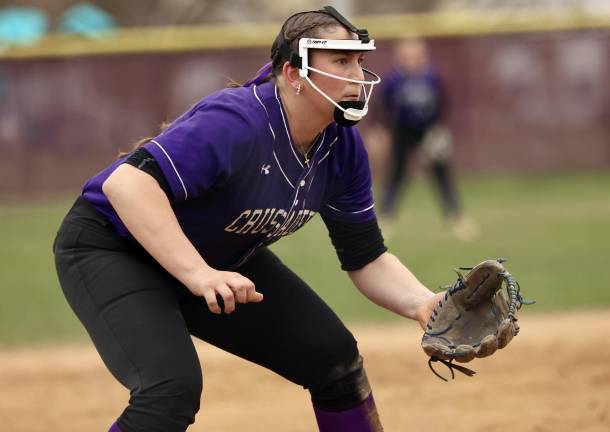 Callie Exarchakis (#12) gets ready at third base.