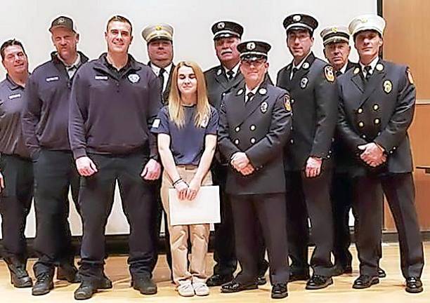Members of the Warwick Fire Department attend the Orange County Firefighters graduation at the O.C. 911 Center in Goshen last week with to graduate firefighter Kaitlyn Wendel from the Excelsior Hose Company #1, daughter of Past Captain Art Wendel.