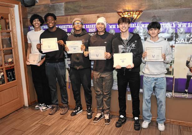 Crusader senior boys Angel Conte, Kamal Salaudeen, Trayvon McGraw, Lee Arroyo, Jamie Reich, and Jason Ramirez.