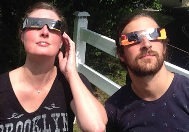 Photo provided by Lajla Abrams Cousins Astrid Cutler and Patrick Angehr watched the eclipse in Monroe.