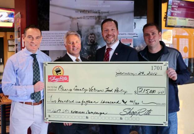 Provided photo Pictured from left to right are Orange County Veterans Service Agency Director Christian Farrell, Brett Wing, president and COO of ShopRite Supermarkets Inc., Vice President of Operations Tom Urtz and Orange County Executive Steven M. Neuhaus at the Town of Monroe Arts and Civic Center on Wednesday, Jan. 24.