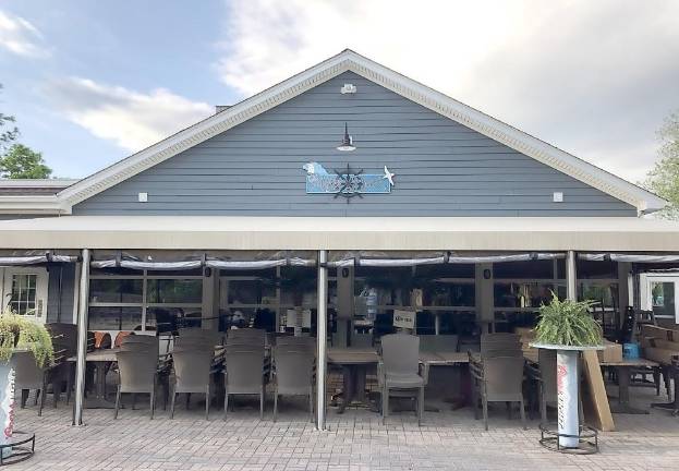 The outdoor dining area at the Captain’s Table in Monroe.