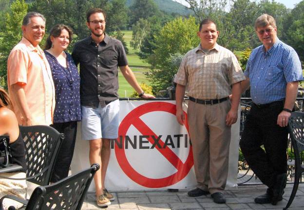 Photo by Linda Mastrogiacomo From left to right are: David Sutz , Village of Woodbury Trustee; Emily Convers, chairwoman of United Monroe and co-founder of Preserve Hudson Valley; Rich Cannava, co-founder of Preserve Hudson Valley; John Allegro, co-founder of Preserve Hudson Valley; and Mike Queenan, Mayor of Woodbury.