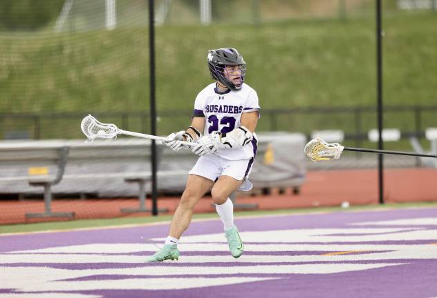 Anthony Severo #22, controls the ball behind the Gladiator goal
