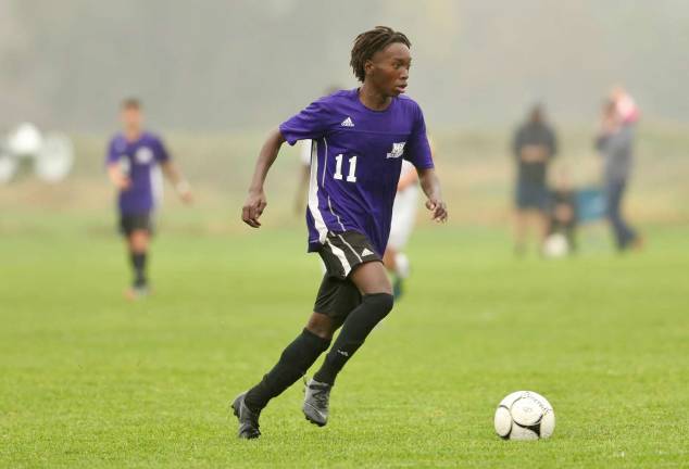 Ikiel Collins-Brown (#11) intercepts a pass and breaks in on goal in the second half.