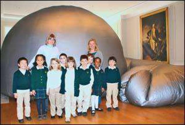 Parent brings the stars to the children at Tuxedo Park School with portable planetarium