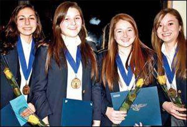 Burke Catholic inducts 36 students into National Honor Society