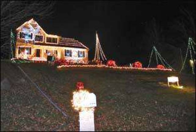 Warwick homeowners' Christmas light show supports Brian Ahearn Children's Fund