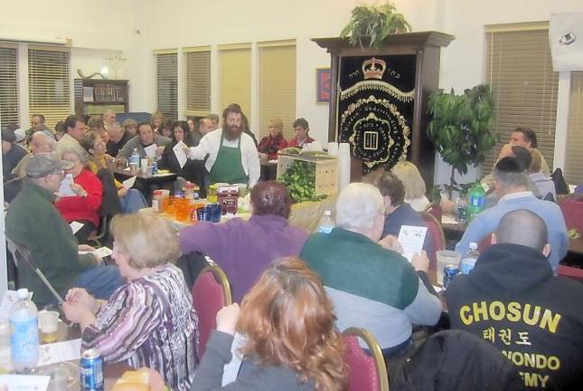 Rabbi Mendy Margolin of Brooklyn, aka “the Pickle Rabbi,” at a previous pickle workshop at Chabad in Chester. He returns this year on Sunday evening, Feb. 9.
