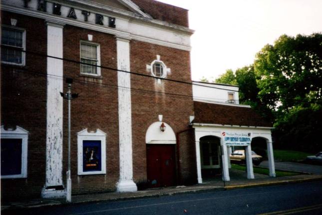 Photo courtesy of the Monroe Historical Society The old Monroe Theater as it appeared in the later years of its operation. It would be demolished and a new theater would eventually be built on the property.