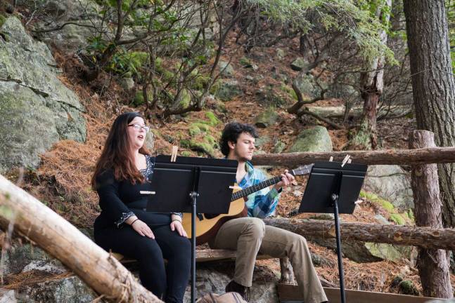 Photo provided by SUNY New Paltz SUNY New Paltz student Brendan White of Monroe, pictured here on guitar, gave a musical performace for hikers along the trail to Mohonk Mountain House on Oct. 21.