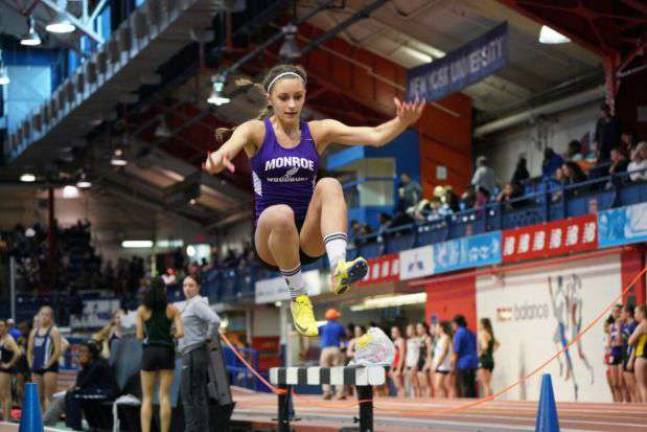 Alicia Johnson won the long jump at the OCIAA Championship held Saturday at West Point with a jump of 16 feet 9 inches.