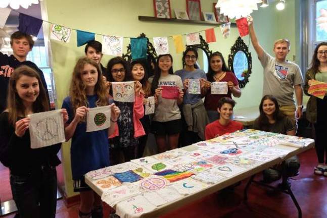 Photo provided Students from the Community Center’s Youth Advisory Board, The Warwick Library’s Teen Advisory Board, and attendees at the recent high school STEAM Fair have been making peace flags to OCNY Pride parade route and the floats.