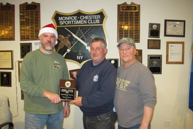 L-R: President Kevin Faith presents the award for Sportsman of the Year to Thomas Gionta, with board member Anthony Meluso.