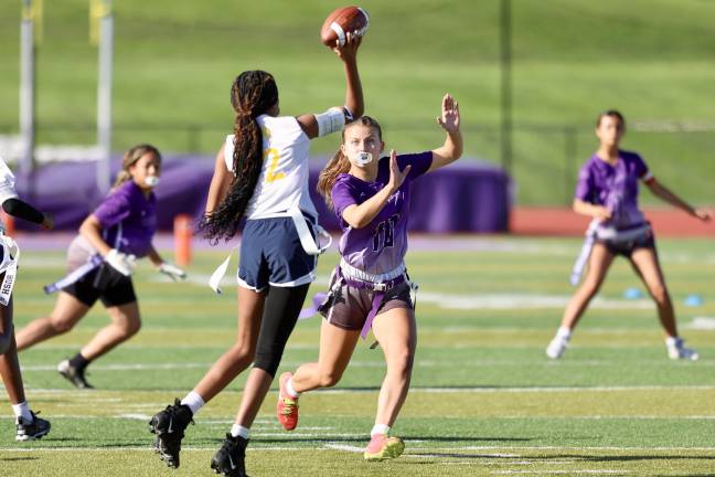 Elaina Wood #10, pressures the Pine Bush QB