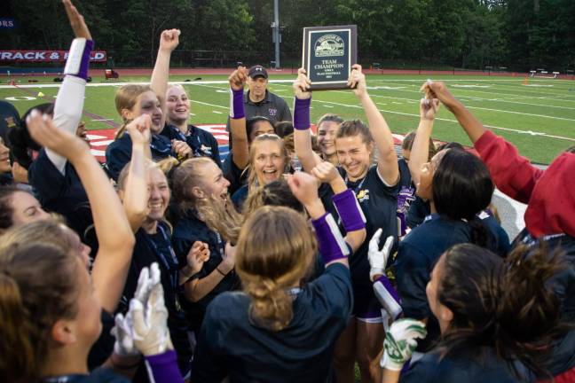 Members of the 2023 Warwick Valley High School girls’ flag football team celebrate winning the section championship. (Photo provided by the Warwick Valley School District)