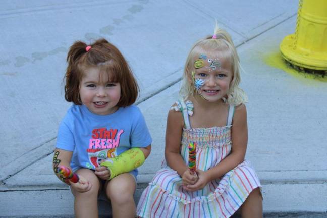 Amalia Tocco and Mila Baier had fun with face paint and sweet treats.
