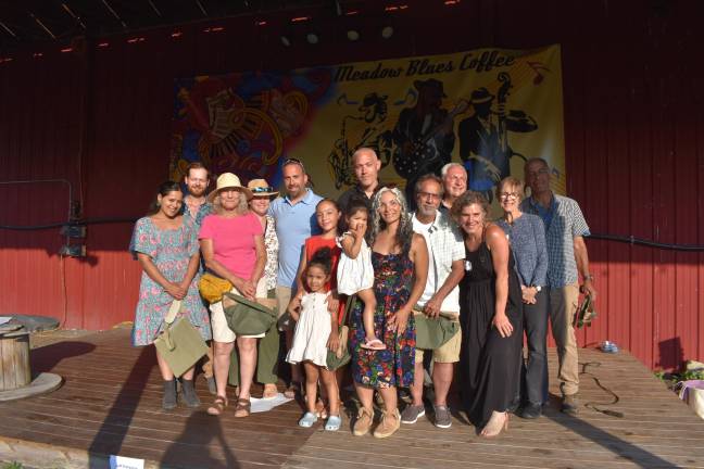 Winning gardeners, from left, are Sohan Dhesi and Patrick Scott; Rhona Bork and family; Ozzie Colon, Lauren Mariotti and children; Chad Pilieri of Grow Local Greenwood Lake; Jim Segal of Wallisch Homestead Community Garden; Dirt publisher Becca Tucker; and Diane and Larry Mansour. (Photo by Molly Colgan)