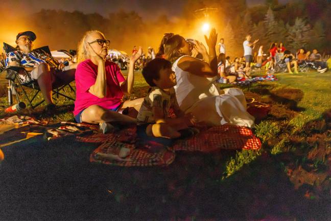 The Annual Monroe Fireworks took place on July 3, 2026, despite ominous clouds, thunder, and lighting. The sky opened for a beautiful sunset before setting spectacularly prior to blastoff. Photos by Sammie Finch