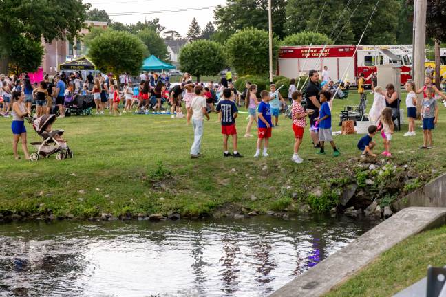 The Annual Monroe Fireworks took place on July 3, 2026, despite ominous clouds, thunder, and lighting. The sky opened for a beautiful sunset before setting spectacularly prior to blastoff. Photos by Sammie Finch
