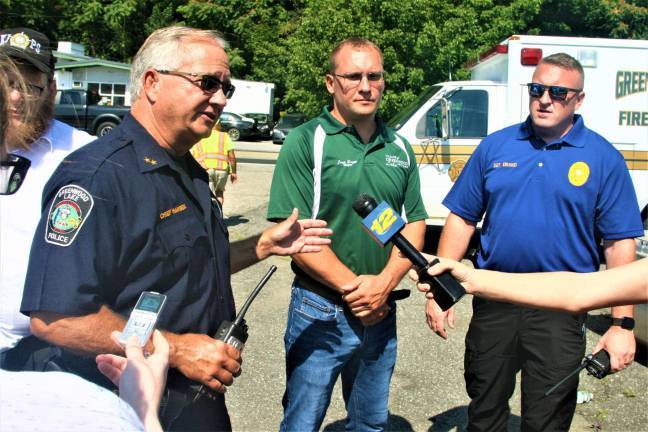 Greenwood Lake Chief of Police John Hansen and Mayor Jesse Dwyer speak with the press at Greenwood Lake Monday morning.