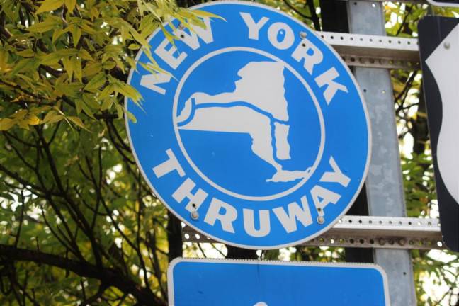 A sign for the New York State Thruway.