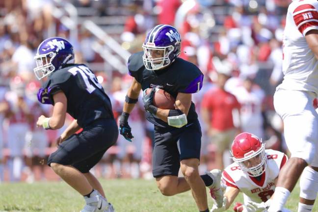 Conor Fitzgibbon, #1, scored a touchdown and picked off two Raider passes.