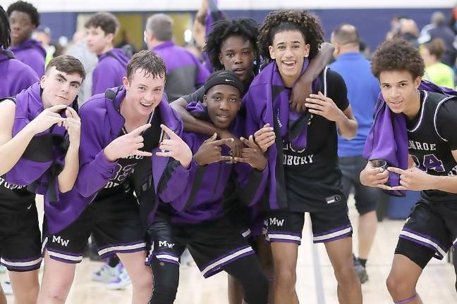 Crusader players celebrate their back-to-back upset victories.