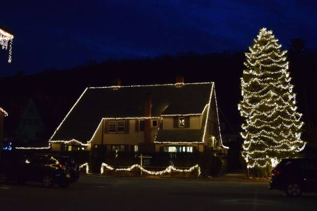 The headaquarters of the Tuxedo Hudson Company on Store Road is lit up for the season, with the giant tree expertly trimmed.