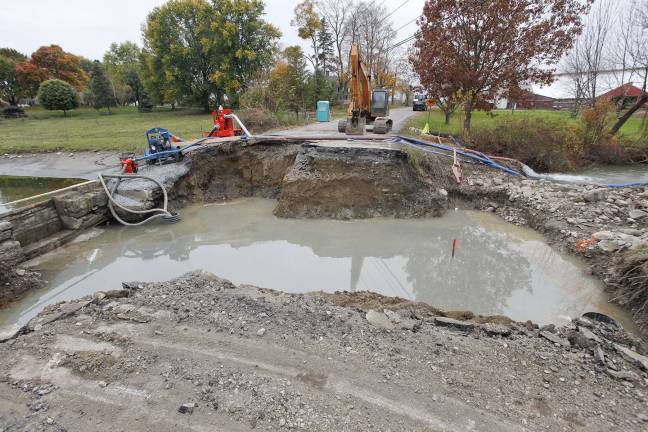 Photo by Robert G. Breese County Route 1 in Warwick is pictured undergoing repairs after Hurricane Irene last summer.