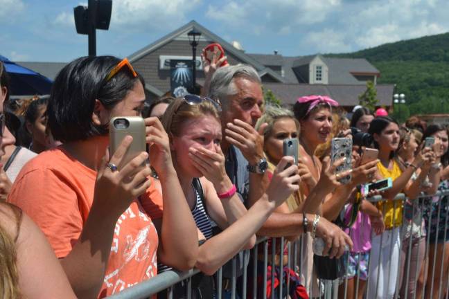 Emotional fans look on at their favorite stars.