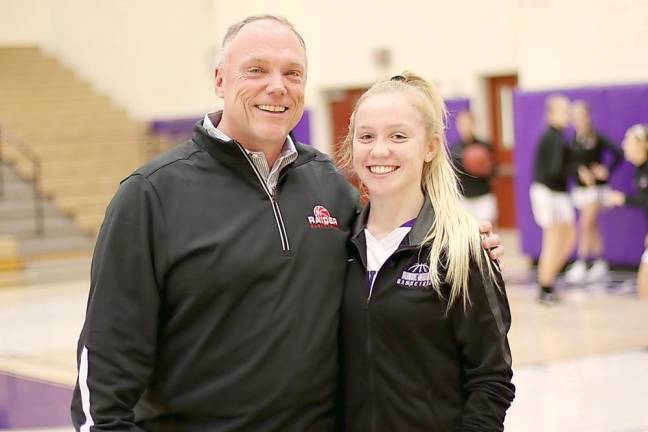 Family Affair: North Rockland Head Coach Kevin Metcalf and his daughter Kiley, a senior on the Crusader varsity girls basketball team, get ready to do battle on Friday afternoon.