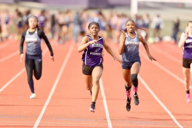 The speedy Kaylen Tenemille, center, took first in the 100 and 200-meter races.