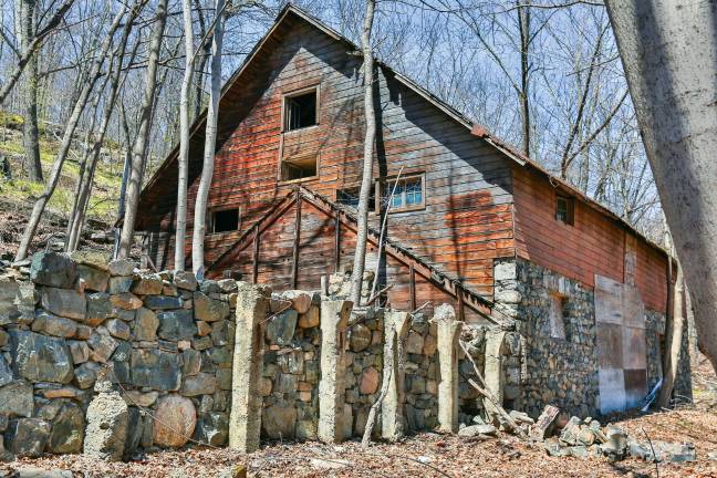 A 200-year-old stone barn on the Stewart Farm property will become the antique dealers center.