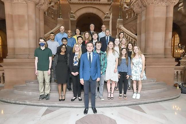 Valedictorians and salutatorians from Skoufis’ district with family members and Skoufis in Albany