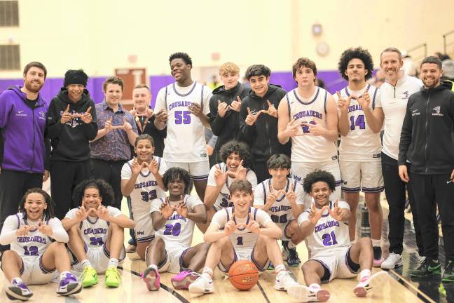 The Crusaders celebrate their 60-50 victory over the Bushmen.